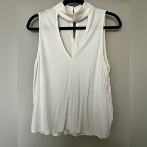 Chic deep creme colored V-neck top in size Large!
